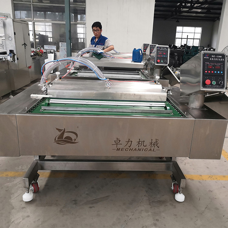 連續(xù)式真空包裝機(jī) 連續(xù)式真空包裝機(jī)