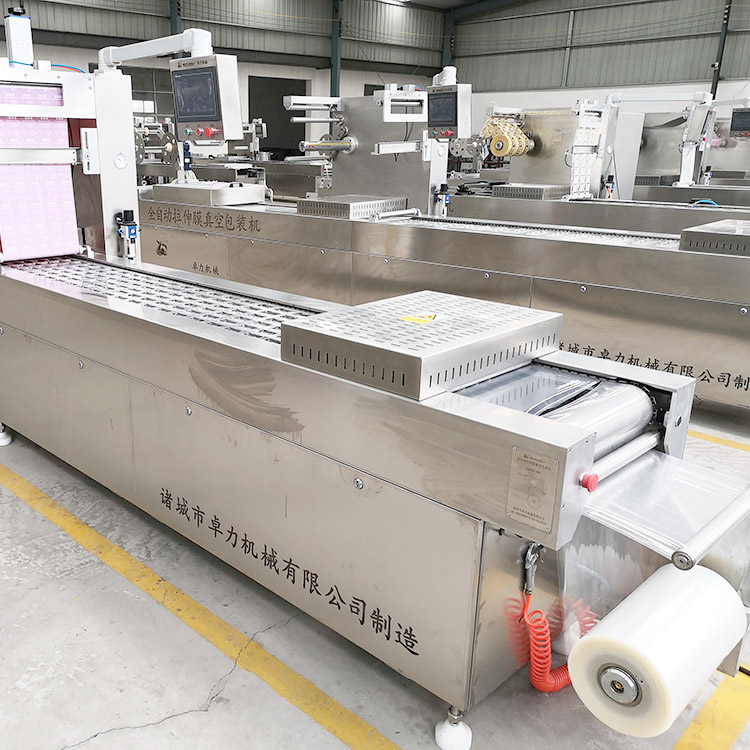 拉伸膜自動真空包裝機 拉伸膜自動真空包裝機